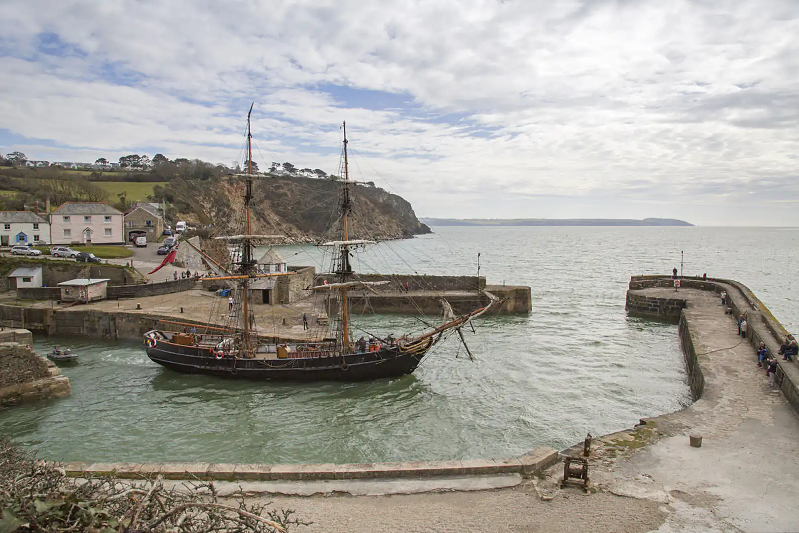 'The Phoenix' ship at Charlestown Harbour, a picturesque dock scene that is one of many Cornish locations that inspired Winston Graham's 'Poldark', an author inspired by Cornwall.